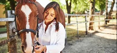 Dr. Ana Silva with a horse