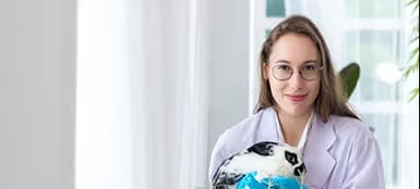 Dr. Sarah Chen holding a rabbit