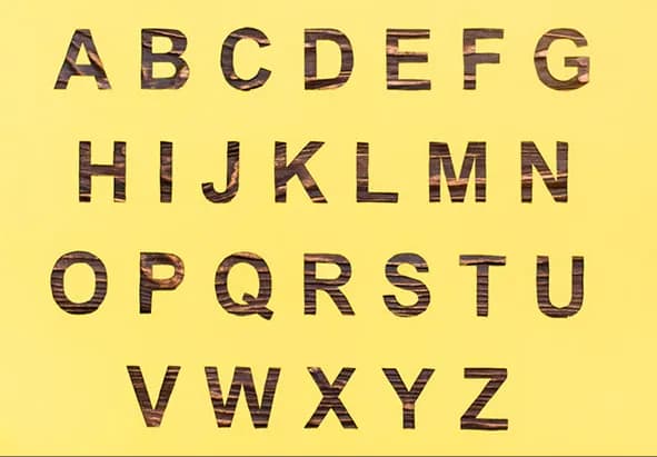 Wooden letters A to Z on a yellow background