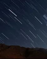 Star trails over a night sky