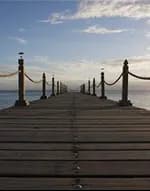 A wooden pier stretching out to sea