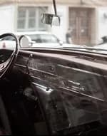 The dashboard of a vintage car