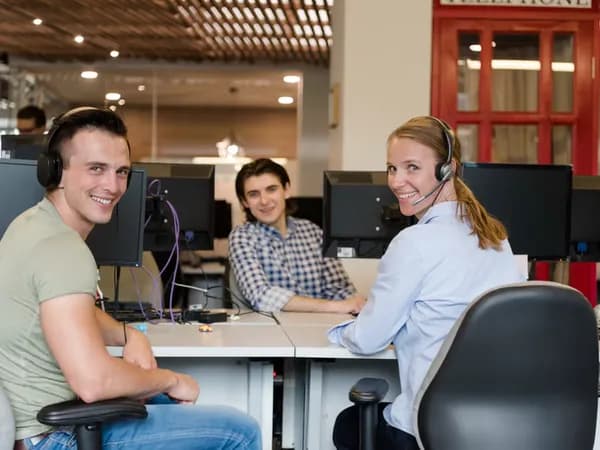 Support team working together in an office
